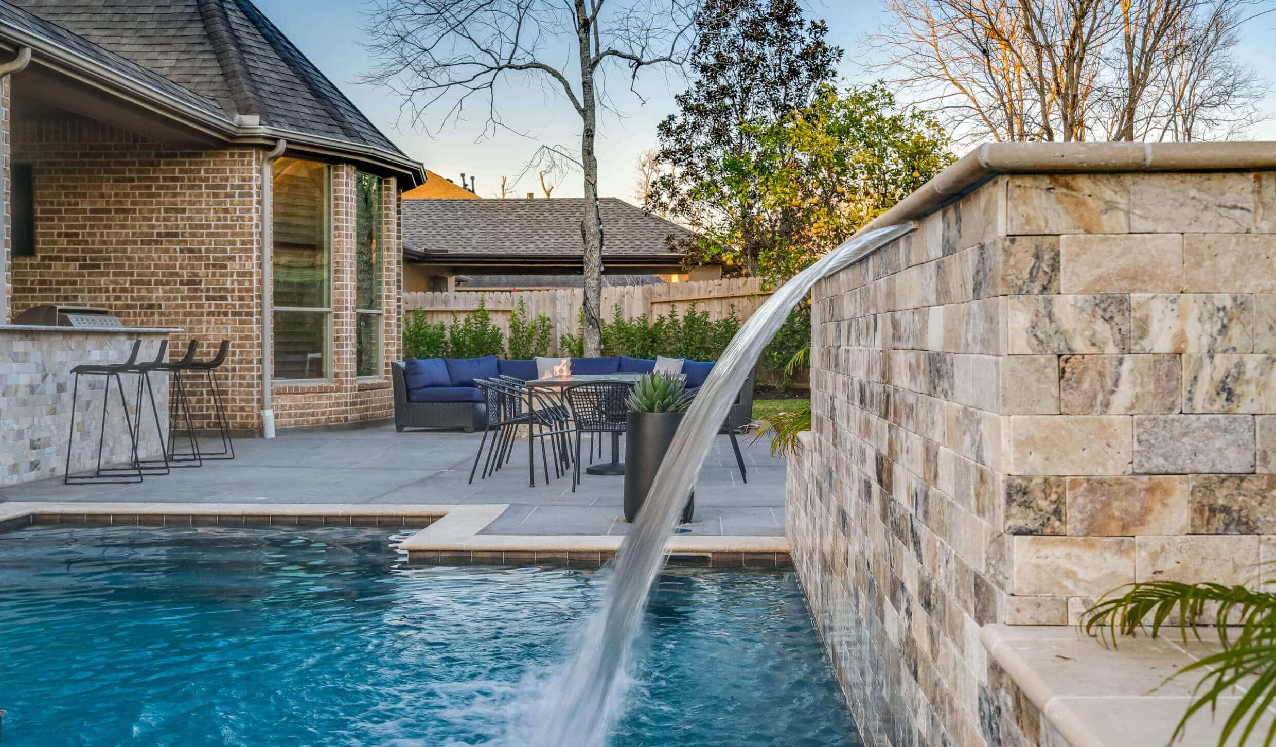 Water features add a unique element to your custom pool
