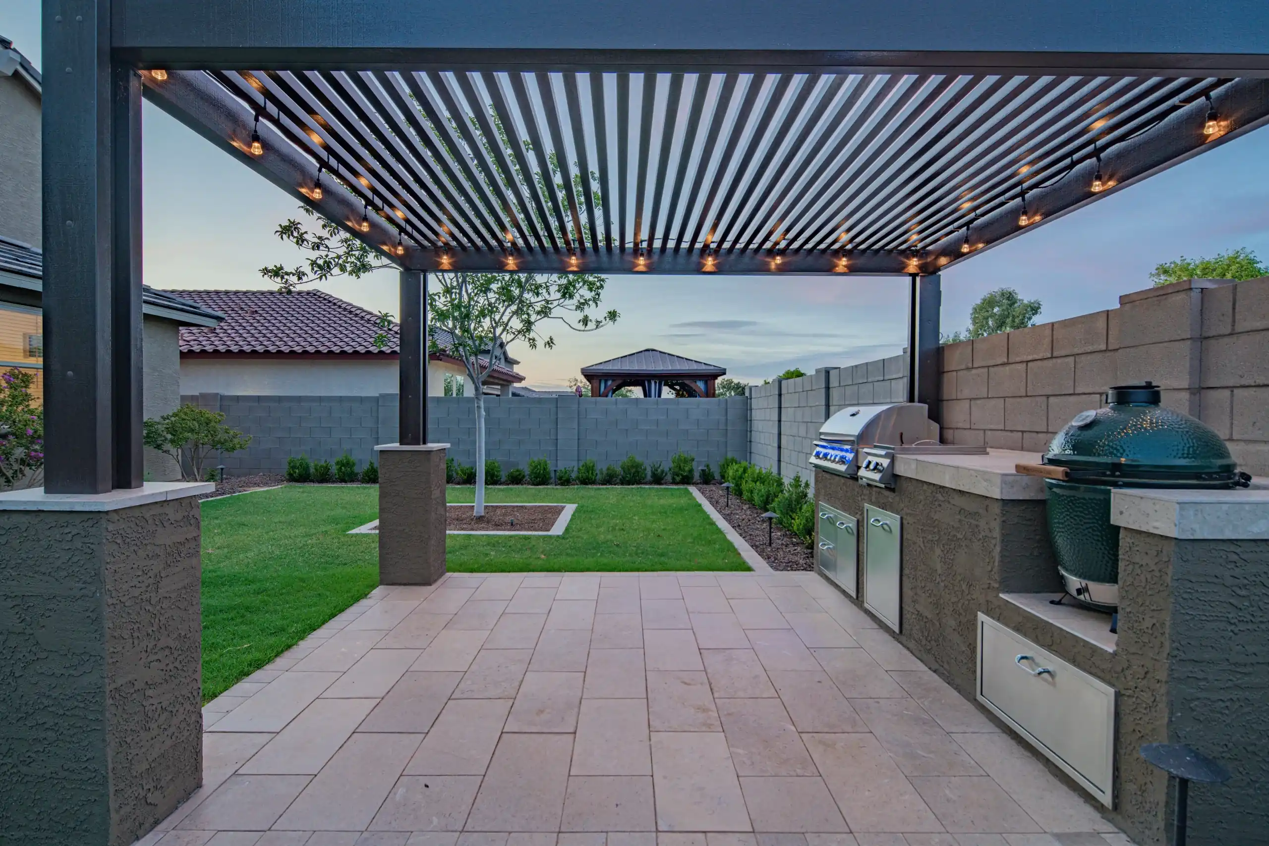 aluminum pergola construction with outdoor kitchen in dallas, tx